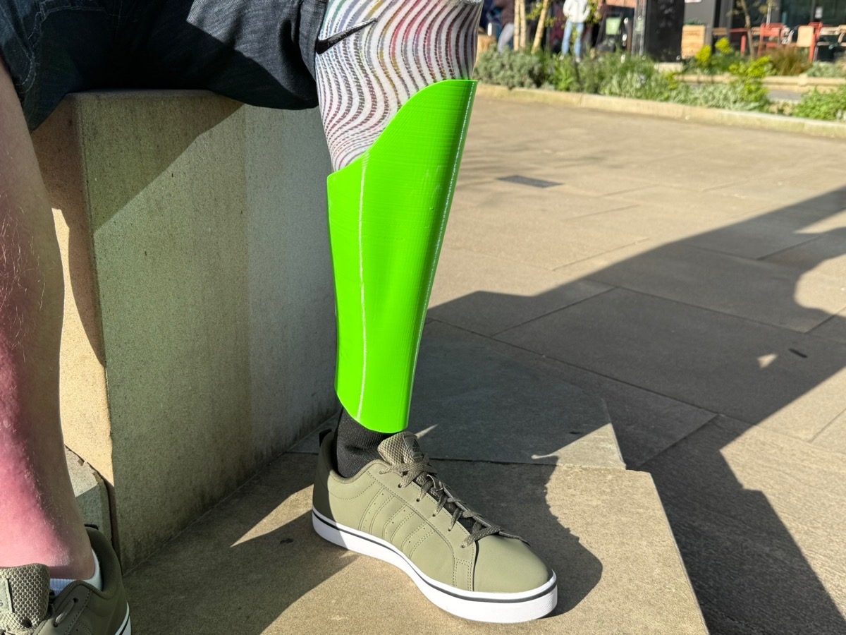 A lime green StyleLimb cover worn outdoors